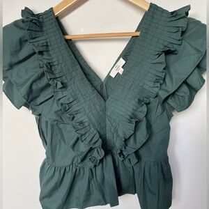 Entro Solid V-neck peplum top. Size medium. NWOT.